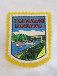 Saimaan kanava -kangasmerkki / matkailumerkki / hihamerkki / badge -pohjaväri keltainen