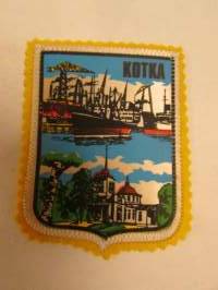 Kotka -kangasmerkki / matkailumerkki / hihamerkki / badge -pohjaväri keltainen