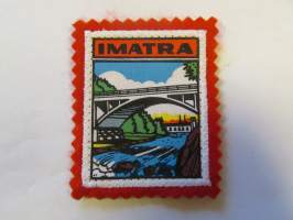 Imatra -kangasmerkki / matkailumerkki / hihamerkki / badge -pohjaväri punainen