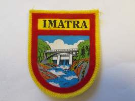 Imatra -kangasmerkki / matkailumerkki / hihamerkki / badge -pohjaväri keltainen