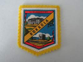 Kokkola - Gamlakarleby -kangasmerkki / matkailumerkki / hihamerkki / badge -pohjaväri keltainen