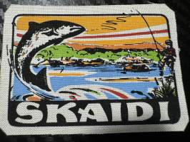 Skaidi -kangasmerkki / matkailumerkki / hihamerkki / badge -pohjaväri valkoinen
