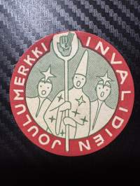 Invalidien joulumerkki -matkalaukkumerkki