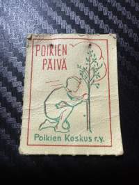 Poikien päivä -matkalaukkumerkki