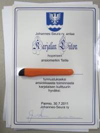 Johannes-Seura ry / Karjalan Liitto, hopeinen ansiomerkki -myöntökirja