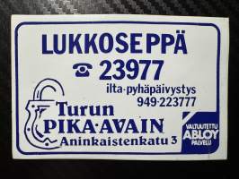 Lukkoseppä tarra