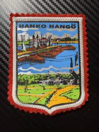 Hanko Hangö -kangasmerkki / matkailumerkki / hihamerkki / badge -pohjaväri punainen
