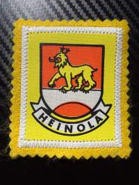 Heinola -kangasmerkki / matkailumerkki / hihamerkki / badge -pohjaväri keltainen