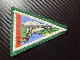 Heinola -kangasmerkki / matkailumerkki / hihamerkki / badge -pohjaväri vihreä