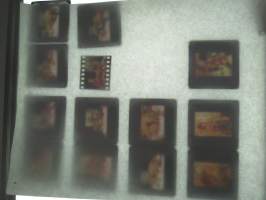 Eroottinen valokuvasarja, 14 diakuvaa, hankittu kansainvälisiltä kuvatoimistoilta käytettäväksi kotimaisten miestenlehtien artikkelien / juttujen kuvituksena