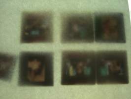 Eroottinen valokuvasarja, 7 diakuvaa, hankittu kansainvälisiltä kuvatoimistoilta käytettäväksi kotimaisten miestenlehtien artikkelien / juttujen kuvituksena