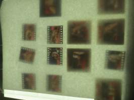 Eroottinen valokuvasarja, 13 diakuvaa, hankittu kansainvälisiltä kuvatoimistoilta käytettäväksi kotimaisten miestenlehtien artikkelien / juttujen kuvituksena