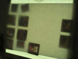 Eroottinen valokuvasarja, 11 diakuvaa, hankittu kansainvälisiltä kuvatoimistoilta käytettäväksi kotimaisten miestenlehtien artikkelien / juttujen kuvituksena