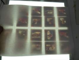 Eroottinen valokuvasarja, 20 diakuvaa, hankittu kansainvälisiltä kuvatoimistoilta käytettäväksi kotimaisten miestenlehtien artikkelien / juttujen kuvituksena