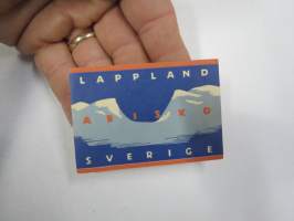 Abisko - Lappland - Sverige -matkailumerkki, paperia, liima taustapuolella