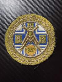 1947 -kangasmerkki / hihamerkki / badge