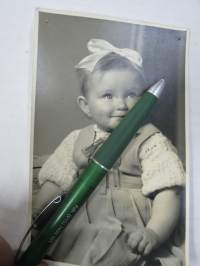 Nappisilmä -valokuva