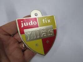 Ylläs judo fix -hintalappu / tuotetietolappu, merkin valmistaja Herman Mattsson Korkokuvapaino & Pussitehdas, Vaasa
