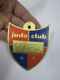 Ylläs judo club -hintalappu / tuotetietolappu, merkin valmistaja Herman Mattsson Korkokuvapaino & Pussitehdas, Vaasa