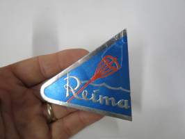 Reima -hintalappu / tuotetietolappu, merkin valmistaja Herman Mattsson Korkokuvapaino & Pussitehdas, Vaasa