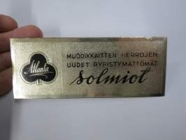 Atlanta - Muodikkaitten herrojen uudet rypistymättömät solmiot -hintalappu / tuotetietolappu, merkin valmistaja Herman Mattsson Korkokuvapaino & Pussitehdas, Vaasa