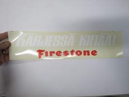 Kärjessä kiitää! Firestone -tarra, alkuperäinen 1970/80 -lukujen mainostarra